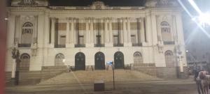 a large white building with stairs in front of it at Lapa Casa Hostel in Rio de Janeiro