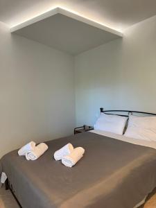 A bed or beds in a room at Panorama Studio