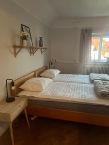 Ένα ή περισσότερα κρεβάτια σε δωμάτιο στο Apartment in Central Ystad