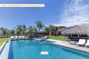 an image of a swimming pool at a villa at Casa da Praia, mansão à beira mar no Fortim in Maceio