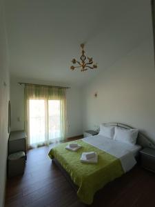 Кровать или кровати в номере Villa Oxana