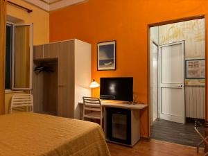 TV a/nebo společenská místnost v ubytování Hotel Annunziata