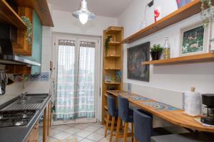 a kitchen with a counter top and a sink at Casa Angelika near Milan, Malpensa, Rho Fiera in Legnano