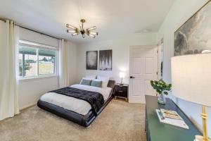 a bedroom with a bed and a window at 7 Mi to Dtwn Charming Retreat with Yard in Boise in Boise