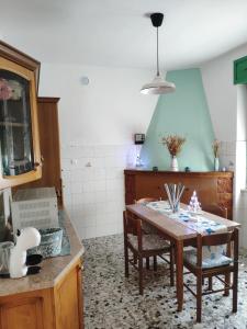 Posezení v ubytování Casa vacanze l'Ulivo + 26 fotografií