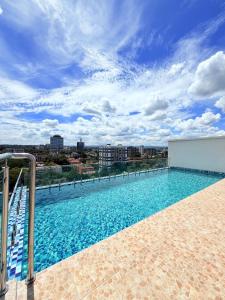 a swimming pool on the roof of a building at M&D Zenith Place in Nairobi
