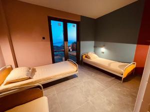 Postel nebo postele na pokoji v ubytování Villa sea, sun and fun