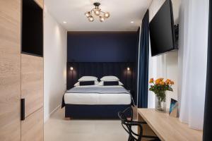 Postel nebo postele na pokoji v ubytování Luxury rooms Unicus I, II, IV