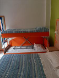 Postel nebo postele na pokoji v ubytování Hotel Consul