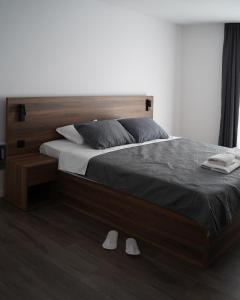 Postel nebo postele na pokoji v ubytování Fole Apart Hotel