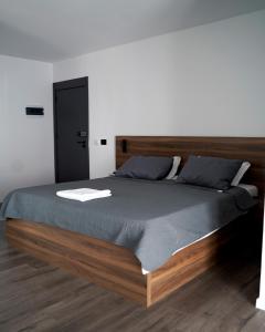 Postel nebo postele na pokoji v ubytování Fole Apart Hotel
