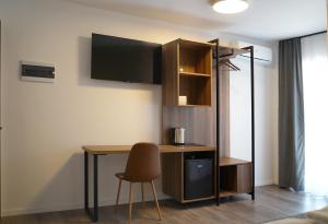 Kuchyň nebo kuchyňský kout v ubytování Fole Apart Hotel