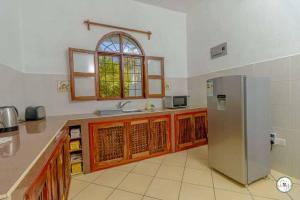 Kuchyň nebo kuchyňský kout v ubytování Mlima cottage