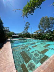 Bazén v ubytování La Puerta de Malacatiupan nebo v jeho okolí