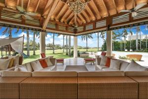 a living room with a large couch in a pavilion at Casa del Sol in La Romana +33 photos