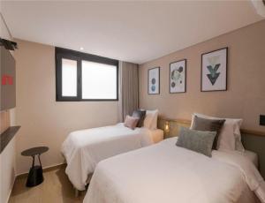 Postel nebo postele na pokoji v ubytování Obo Hotel + 37 fotografií