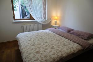 Postel nebo postele na pokoji v ubytování Viletta Natali + 21 fotografií