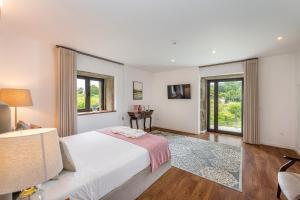 Postel nebo postele na pokoji v ubytování Casa d'Amares + 37 fotografií