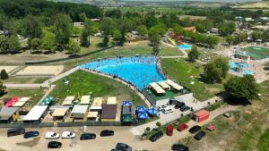 an aerial view of a water park with a large pool at Apartman Cañas Zelená Víla in Rimavská Sobota +9 photos