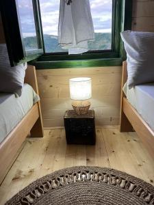 Ένα ή περισσότερα κρεβάτια σε δωμάτιο στο Brvnare Puljci 2