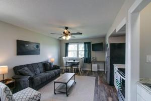 a living room with a couch and a table at The Loft 1335 Whitt Ln in Clarksville
