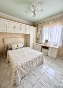 Posteľ alebo postele v izbe v ubytovaní Villa Violetta