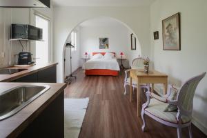 Kuchyň nebo kuchyňský kout v ubytování Casa dos Arcos - Studios & Pool