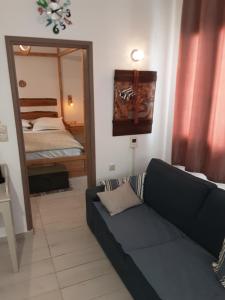 Postel nebo postele na pokoji v ubytování Lindos Alley