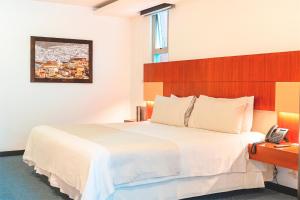 Letto o letti in una camera di Hotel Finlandia