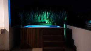 Fotografie z fotogalerie ubytování Vila Pitangueira - Flat Terra - No centro de Serra Grande com Piscina, Jacuzzi, Internet Veloz v destinaci Serra Grande
