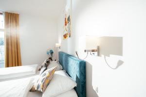 Ein Bett oder Betten in einem Zimmer der Unterkunft BO Hotel Hamburg
