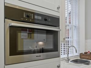 Köök või kööginurk majutusasutuses Coastguard Retreat +7 fotot