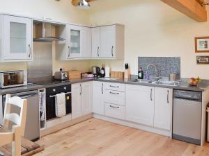Kuchyň nebo kuchyňský kout v ubytování Brow View Cottage + 14 fotografií