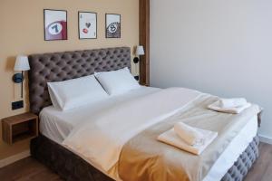 Katil atau katil-katil dalam bilik di Garni Hotel Maggitti