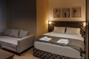 Katil atau katil-katil dalam bilik di Garni Hotel Maggitti
