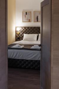 Katil atau katil-katil dalam bilik di Garni Hotel Maggitti
