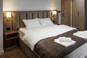 Katil atau katil-katil dalam bilik di Garni Hotel Maggitti