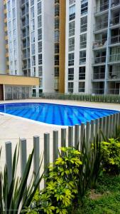 Swimmingpoolen hos eller tæt på Apartamento en Armenia - Con Piscina