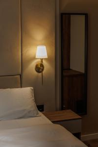 Katil atau katil-katil dalam bilik di Garni Hotel Maggitti