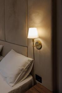 Katil atau katil-katil dalam bilik di Garni Hotel Maggitti