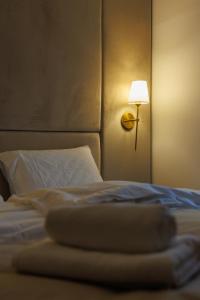 Katil atau katil-katil dalam bilik di Garni Hotel Maggitti