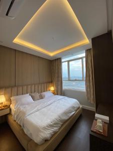 Ένα ή περισσότερα κρεβάτια σε δωμάτιο στο 814 VIP Apartment