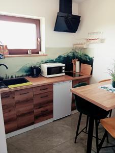 Η κουζίνα ή μικρή κουζίνα στο Gościniec u Antka