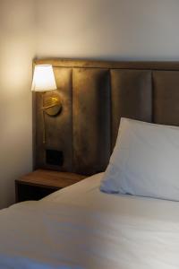 Katil atau katil-katil dalam bilik di Garni Hotel Maggitti