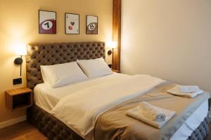 Katil atau katil-katil dalam bilik di Garni Hotel Maggitti