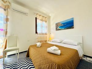 Postel nebo postele na pokoji v ubytování Villa Giada + 37 fotografií