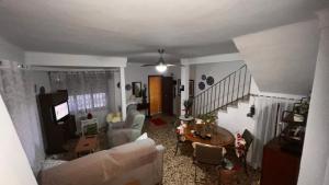 a living room with a couch and a table at La sal de Terreros in San Juan de los Terreros