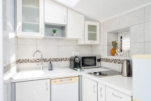 Kuchyň nebo kuchyňský kout v ubytování Main Square Loft - ZF Hvar