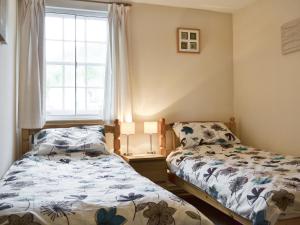 Katil atau katil-katil dalam bilik di Mill Pond Cottage +3 gambar