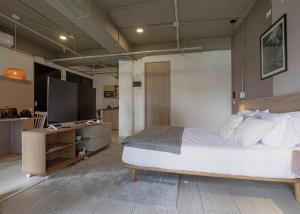 Χώρος καθιστικού στο Cozy and Bright Studio Loft in Central Laureles